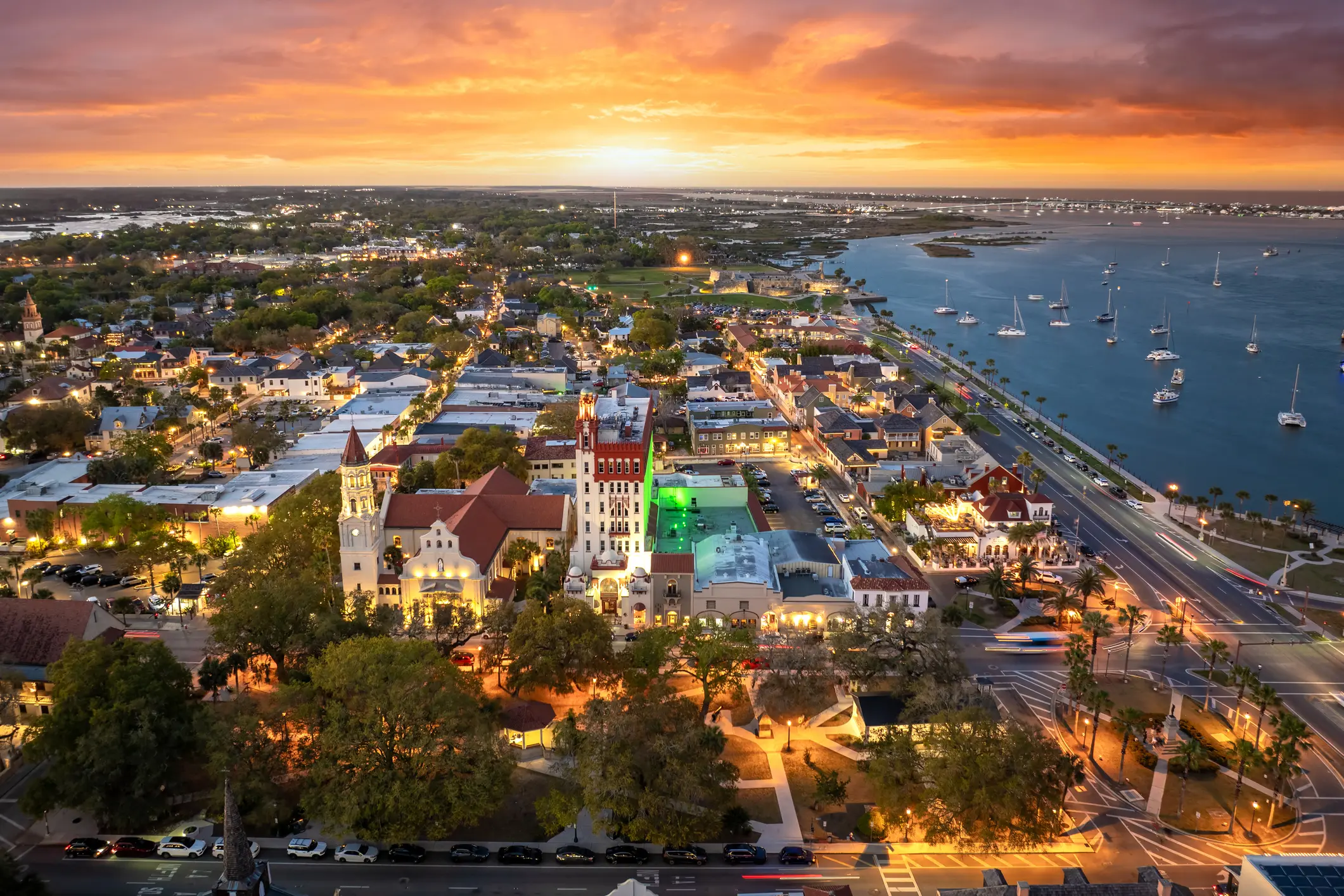Historical American city architecture. St. Augustine, old city in Florida state at night. Streets and buildings from above.